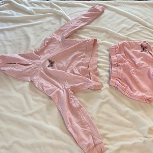 A matching pink butterfly set